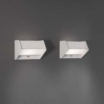 Pair of white lacquered wall lights by Jacques Biny