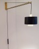 Telescopic arm wall light by Gaetano Scoiolari