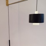 Telescopic arm wall light by Gaetano Scoiolari