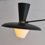 Rare double arm wall light with black lacquered lampshade by Robert Mathieu