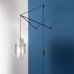 Rare adjustable wall light with 3 attachment points by Robert Mathieu 