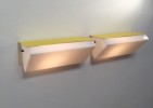 Pair of yellow wall lights by Jacques Biny