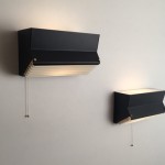 Pair of black and white wall lights model 211 by Jacques Biny
