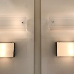 Pair of 250 model wall lights by Jacques Biny