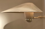 Rare wall light with perforated lampshade by Jean Boris Lacroix