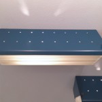 Pair of blue lacquered wall lights with shutters by Jacques Biny