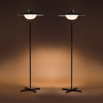 Pair of Jacques Biny floor lamps.